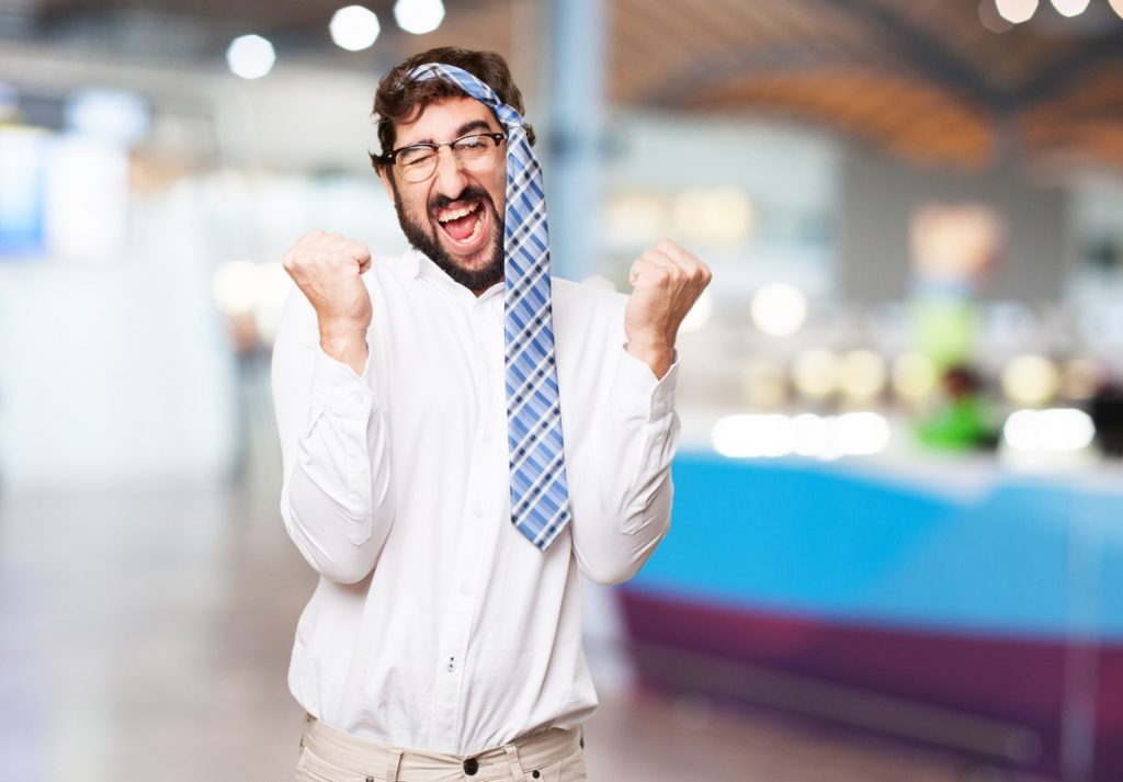 Man with tie on his head